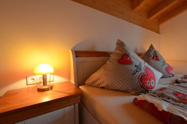 Schlafzimmer  Berg- und Seetraum - Feriendorf Via Claudia Haus 64