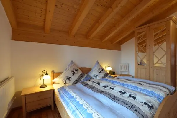 Schlafzimmer  Berg- und Seetraum - Feriendorf Via Claudia Haus 64