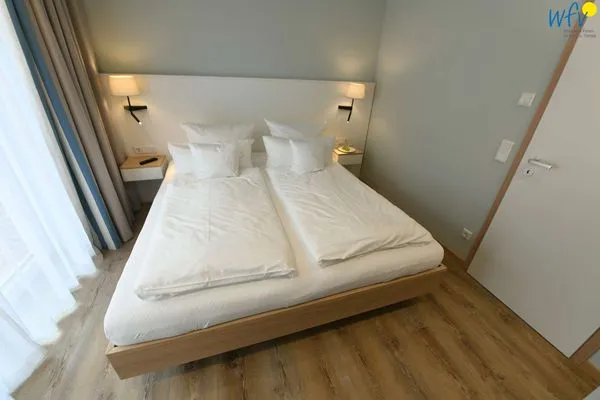 Schlafzimmer Töwerhus Ferienwohnung Robbe