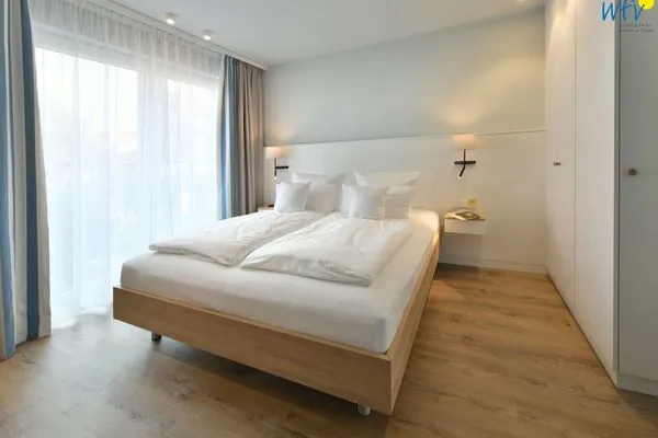 Schlafzimmer Töwerhus Ferienwohnung Sonne