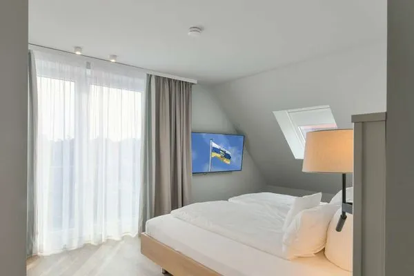 Schlafzimmer Töwerhus Ferienwohnung Hummer