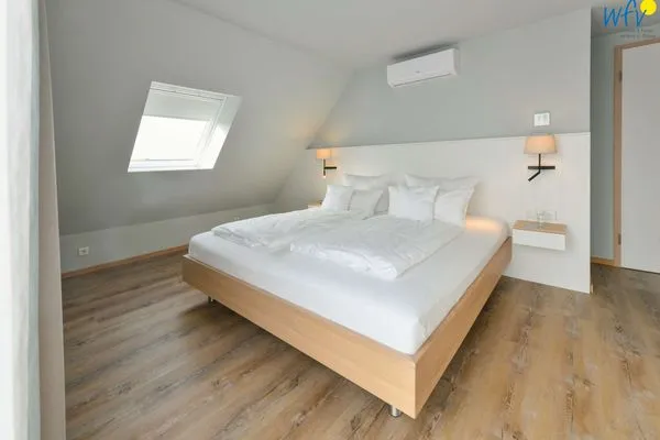 Schlafzimmer Töwerhus Ferienwohnung Hummer