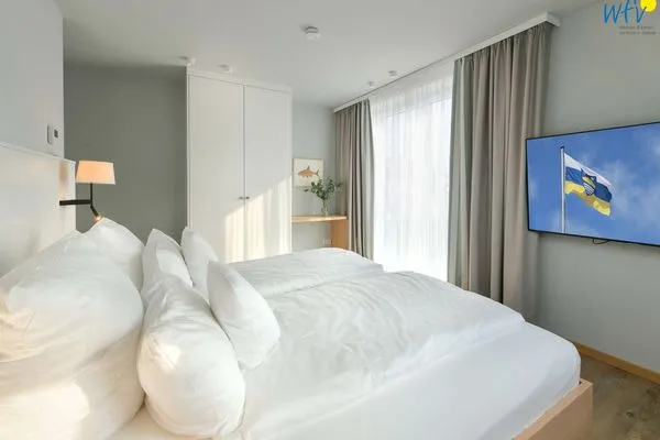 Schlafzimmer Töwerhus Ferienwohnung Hummer