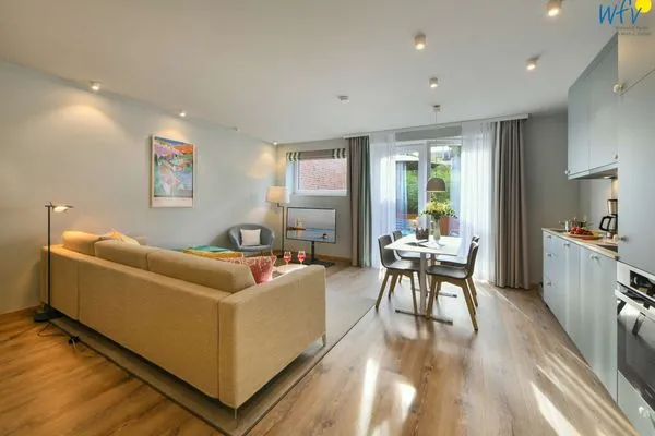 Wohnzimmer Töwerhus Ferienwohnungen Segel + Seestern