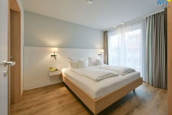 Schlafzimmer Töwerhus Ferienwohnungen Watt + Bill