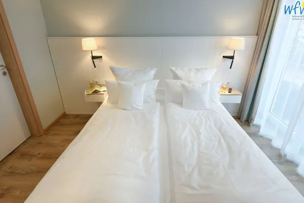 Schlafzimmer Töwerhus Ferienwohnungen Watt + Bill