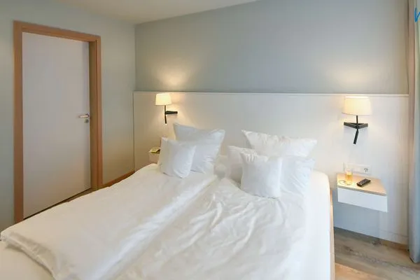 Schlafzimmer Töwerhus Ferienwohnungen Watt + Bill