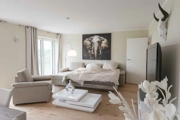 Wohnzimmer  (STR92) Ferienwohnung "Gartenresidenz Strandstraße"