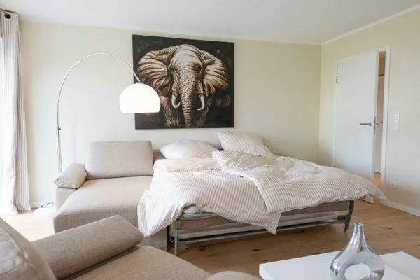 Wohnzimmer  (STR92) Ferienwohnung "Gartenresidenz Strandstraße"