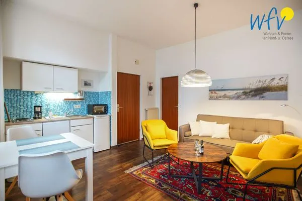 Wohnzimmer Kirchstr. 11 Borkum Ferienwohnung Bollstove