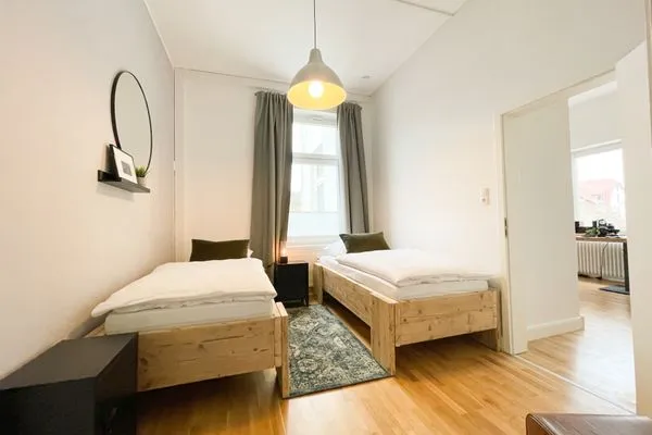 Schlafzimmer  Altbauwohnung mit Panorama Schleiblick, Balkon und Kamin im Herzen von Schleswig