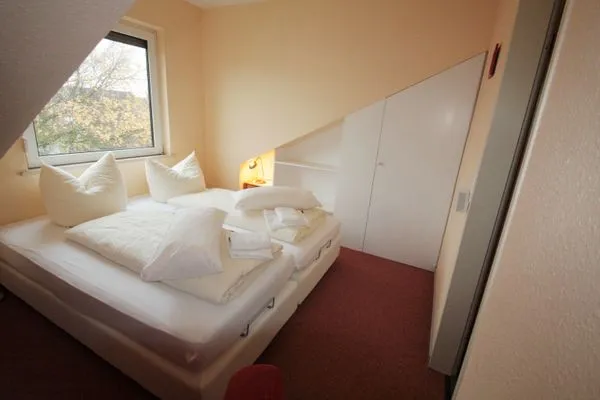 Schlafzimmer Haus am Kurpark Wohnung 21