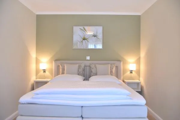 Schlafzimmer mit Doppelbett Logierhaus Friedrich WE 5 - "Ostseewelle"