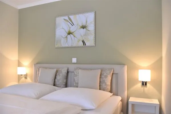 Schlafzimmer mit Doppelbett Logierhaus Friedrich WE 5 - "Ostseewelle"