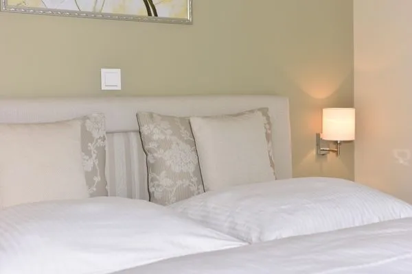 Schlafzimmer mit Doppelbett Logierhaus Friedrich WE 5 - "Ostseewelle"