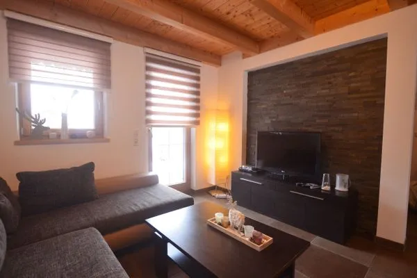 Wohnzimmer  Dominique - Feriendorf Via Claudia Haus 100