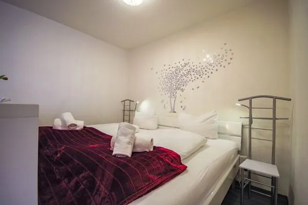 Apartmenthaus Frauenpreiss FeWo 111 Sahlenburg - Bett