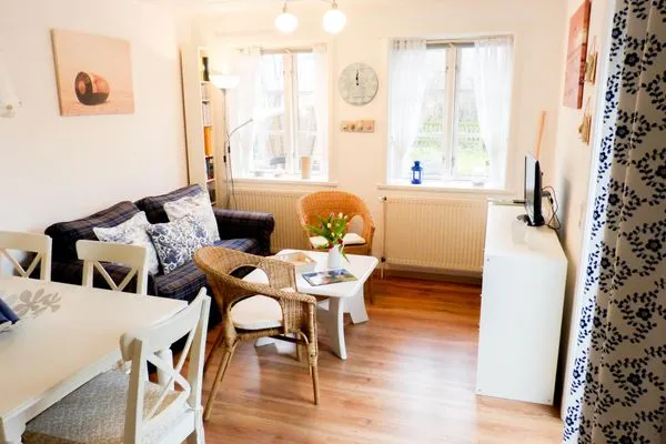 Wohnzimmer in der Ferienwohnung Hopelfask in Süddorf auf Amrum Hüs Sanskiin Ferienwohnung *Hopelfask*