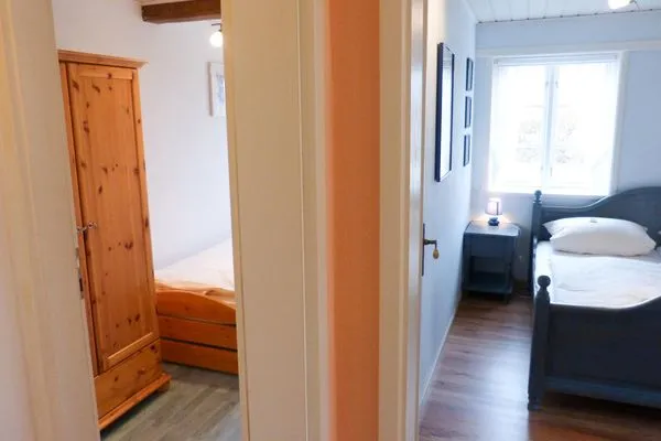 Schlafzimmer in der Ferienwohnun Brombelbei in Süddorf auf Amrum Hüs Sanskiin Ferienwohnung *Brombelbei*