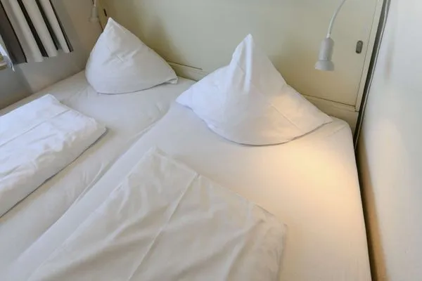 Schlafzimmer Dünenschlösschen Ferienwohnung 10