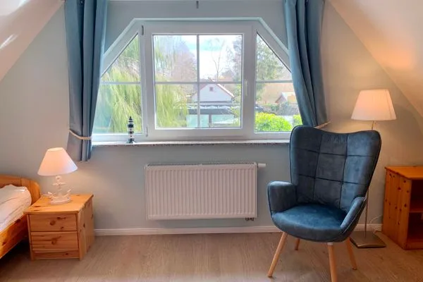 Schlafzimmer mit zwei Einzelbetten  Strandhaus Pilgrim