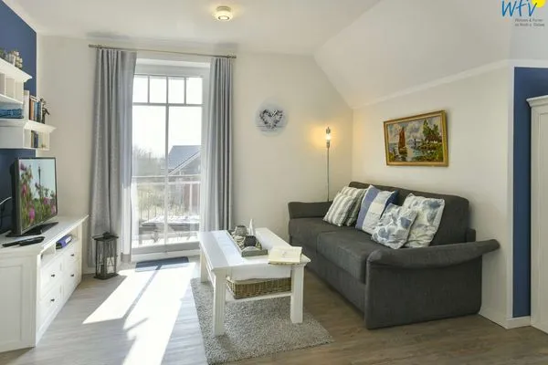 Wohnzimmer Bootshaus in den Dünen - 5 Ferienwohnung 4