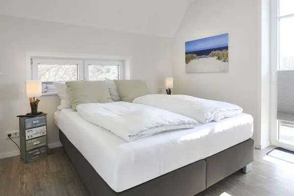 Schlafzimmer Bootshaus in den Dünen - 5 Ferienwohnung 4