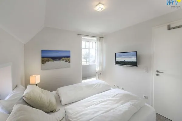 Schlafzimmer Bootshaus in den Dünen - 5 Ferienwohnung 4