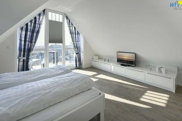 Schlafzimmer Bootshaus in den Dünen - 5 Ferienwohnung 4