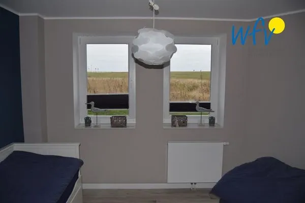 Schlafzimmer Haus Kiek in't Watt Ferienwohnung Deichrausch