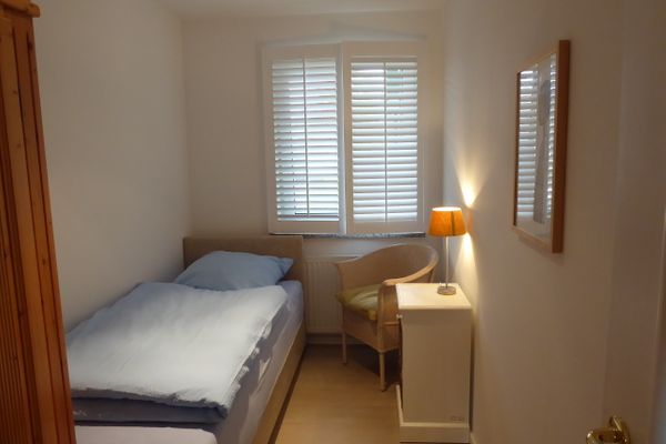  App. Auerhahn im "Schmugglerhus" Wieck - Schlafzimmer