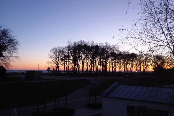 Blick vom Balkon auf den Sonnenuntergang Residenz am Strand Wohnung 2-36