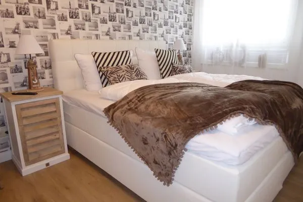 Schlafzimmer mit Doppelbett Residenz am Strand Wohnung 2-36