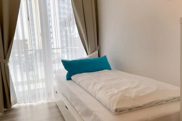 Haus Nordseebrandung FeWo A2.1 Sahlenburg - Bett