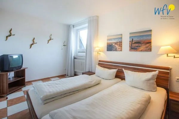 Schlafzimmer Holiday Residenz II Ferienwohnung Borkumer Abendsonne