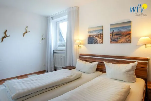 Schlafzimmer Holiday Residenz II Ferienwohnung Borkumer Abendsonne