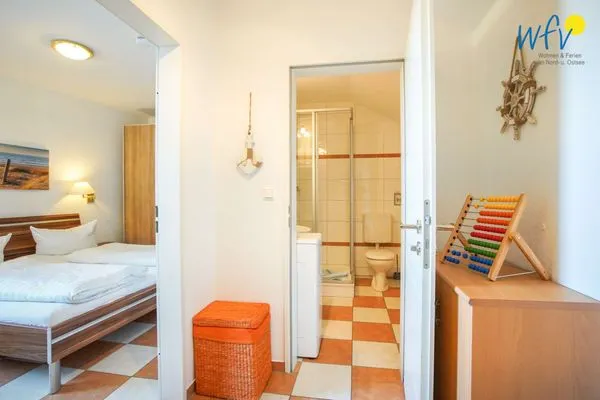 Zugang zum Badezimmer Holiday Residenz II Ferienwohnung Borkumer Abendsonne