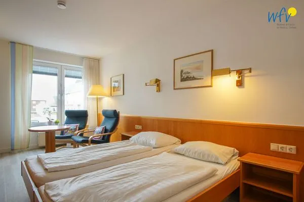 Schlafzimmer Appartement-Haus Regina Ferienwohnung Seeschwalbe