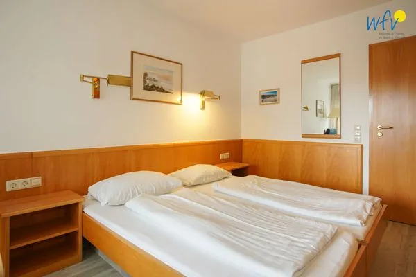 Schlafzimmer Appartement-Haus Regina Ferienwohnung Seeschwalbe