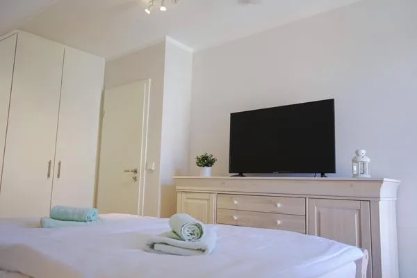 Schlafzimmer mit Doppelbett  Strandperle - Anlage Heiderose