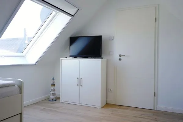 Schlafzimmer mit zwei Einzelbetten  Strandperle - Anlage Heiderose