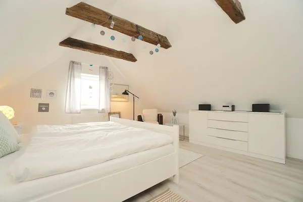 Schlafzimmer  Einladende Ferienunterkunft 'Tischlerhaus' im Herzen von Schleswig