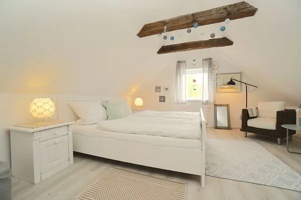 Schlafzimmer  Einladende Ferienunterkunft 'Tischlerhaus' im Herzen von Schleswig