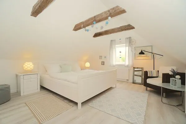 Schlafzimmer  Einladende Ferienunterkunft 'Tischlerhaus' im Herzen von Schleswig