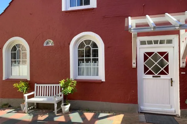 Fassade / Eingang  Einladende Ferienunterkunft 'Tischlerhaus' im Herzen von Schleswig