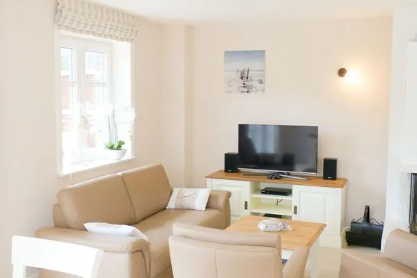 Wohnzimmer in der Ferienwohnung Seepferdchen in Süddorf auf Amrum Heidehüs Friesenhaushälfte *Seepferdchen*