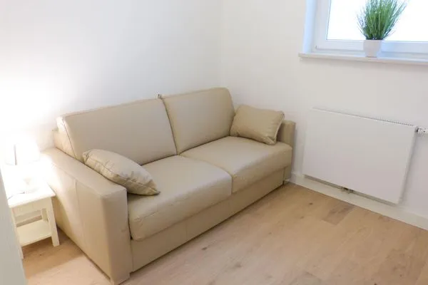 Sofa in der Ferienwohnung Seepferdchen in Süddorf auf Amrum Heidehüs Friesenhaushälfte *Seepferdchen*