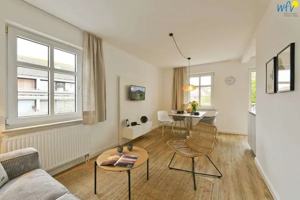 Wohnzimmer Haus am Dorfbrunnen Ferienwohnung Muschel