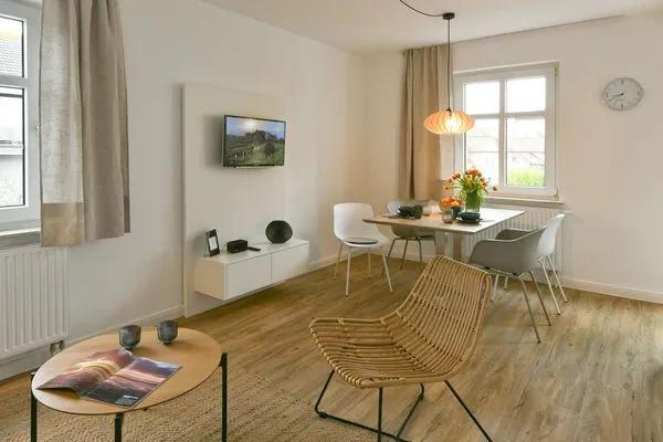 Wohnzimmer Haus am Dorfbrunnen Ferienwohnung Muschel