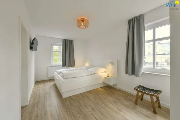 Schlafzimmer Haus am Dorfbrunnen Ferienwohnung Muschel
